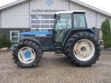 New Holland 7840 SLE, med rigtig god dæk montering og knap på vendergearet. - Afbeelding 1